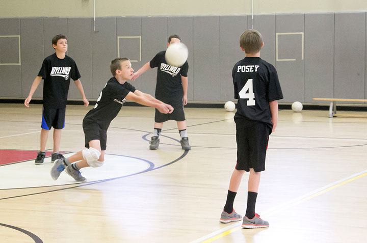 Idyllwild Middle School boys volleyball was held in the gym at Idyllwild School Wednesday afternoon, April 22. Jadon Meskimen, center, bumps the ball against Pinacate Middle School from Perris. Photo by Jenny Kirchner 