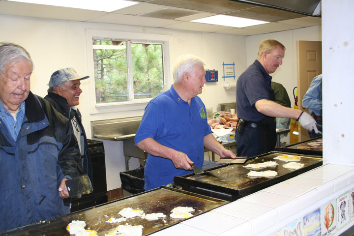 From left, Mel Goldfarb, Rick Percano, Danny Richardson and Patrick Reitz serve up the Idyllwild Rotary Club’s annual Memorial Day weekend pancake breakfast at Town Hall on Sunday Photo by Jack Clark