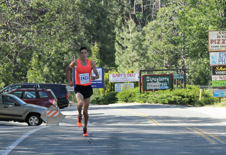 Jayden Emerson ran, won and set course records in both the 5K and 10K races Saturday. His 15:51 easily beat Jeff Ambrose’s 2005 time of 16:28. He finished the 10K run in 35:19, which set the course record. Nick Hamlin’s time of 36:54 was the 10K record since 2005. Photo by John Drake