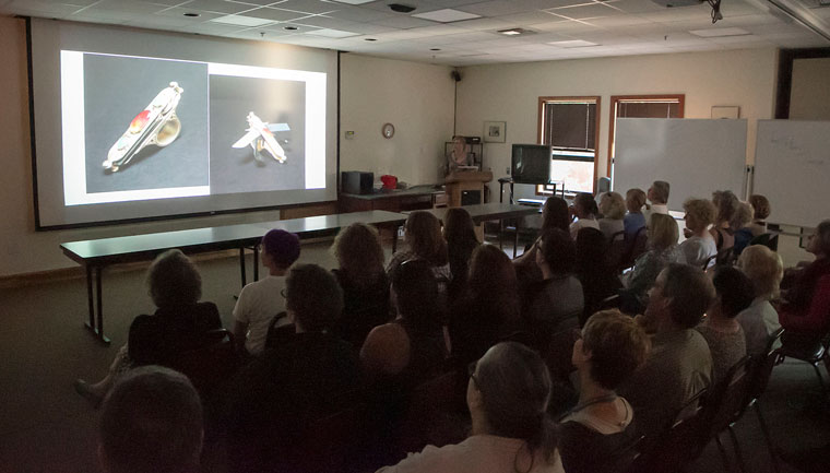 Summer Programs faculty member Maggie Wuarin shows slides of her work during the Metals Week lecture Sunday at Idyllwild Arts.Photo by Jenny Kirchner 