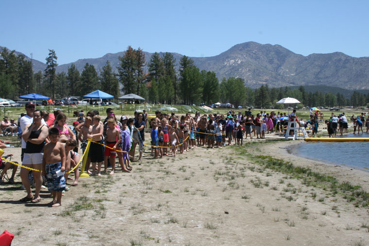 Before the first swimmers were admitted into the water in 20-minute shifts, several hundred people waited in line. Photo by Marshall Smith