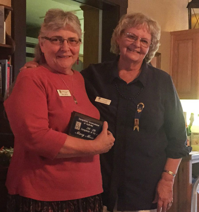 Mary Morse (left), Soroptimist of the Year 2014-15, receives congratulations from President Karen Doshier during the Recognition Dinner on June 17. Photo by Theresa Teel