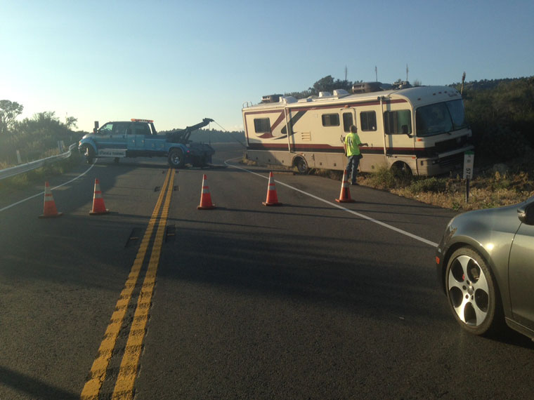 On Monday, June 8, around 6 p.m., a large RV reportedly lost brakes and crossed the yellow line, careening into and lodging against the side of the mountain just south of Mountain Center. Photo by Suzanne Avalon