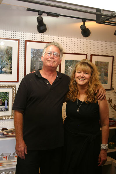 Art opening Artspresso Co-owner Gerry High and artist Kathy Harmon-Luber at her artist reception at the gallery Saturday for the photography exhibition, “Dress: Whispers.” Photo by Becky Clark 