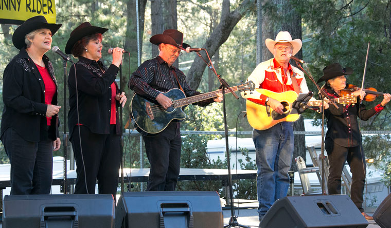 The Red Hot Rhythm Rustlers were featured performers at the Idyllwild Summer Concert Series last Thursday night. The Rustlers performed family-oriented cowboy music. The award-winning group traveled from Arizona to perform in Idyllwild at the Idyllwild Community Park.Photo by Jenny Kirchner 