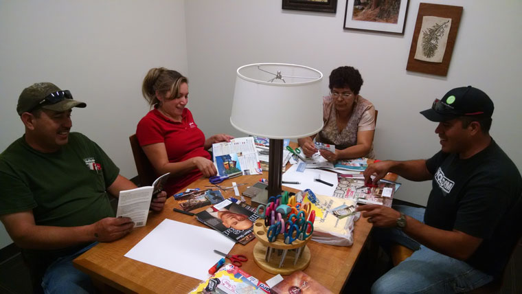 On Tuesday, July 14, the Idyllwild Spanish Book Club held its first gathering. Discussing the “12 Pillars” in Spanish and doing hands-on activities related to each chapter are (from left) Patty and Aurelio Perez, and Rosa and Edgar Santiago. Photo courtesy Jannette Santiago 