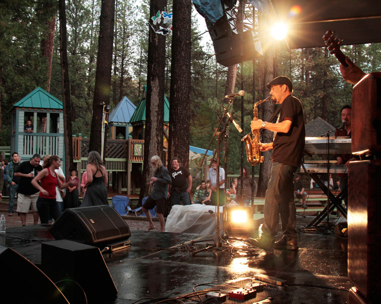 Despite rain, a wet stage and soaked chairs, the fun and joy of another Idyllwild Summer Concert, this one featuring Grupo Bohemio, takes place Thursday evening. Photo by John Drake 