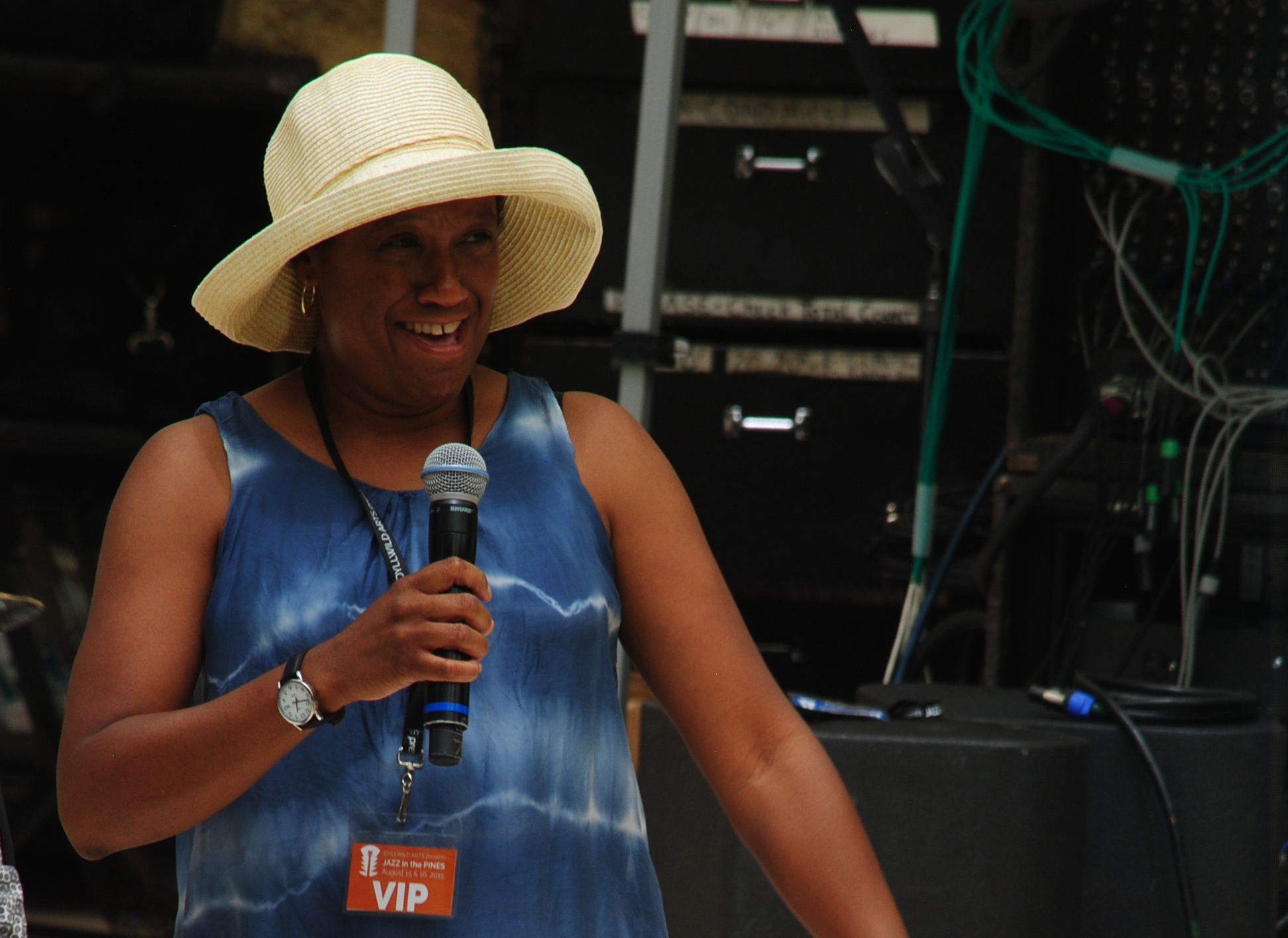 Below, Idyllwild Arts President Pamela Jordan talks to the crowd at the Main Stage. Photo by JP Crumrine