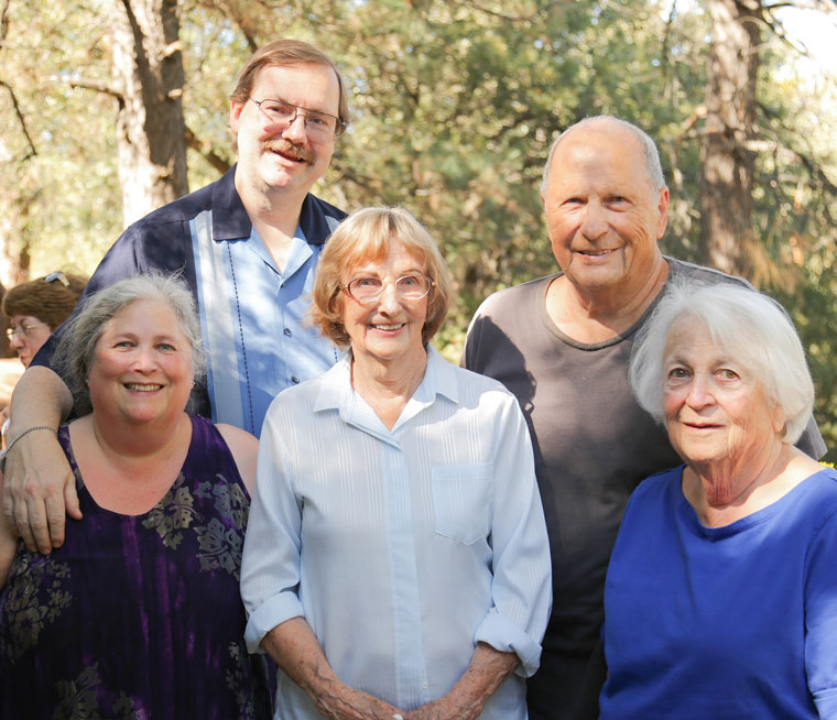 Long-time resident Lee Ralstin (center) of Pine Cove celebrated her 100th birthday Saturday with a party put on by family and friends. Her birthday was Thursday, Sept. 17. Surrounding her, from left, are granddaughter and husband Audrey and Perry Kiehtreiber of San Jose and son and daughter-in-law Lee and Rose Myers, also of San Jose. Photo by Cheryl Basye