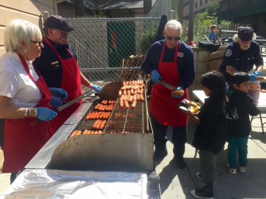 Members of the Idyllwild Volunteer Fire Company, (from left) Rhonda Andrewson, Jim Kutsch, Paul Riggi and Jon Engel, barbecued hotdogs for students at Idyllwild School Friday. Photo by Jenny Kirchner Quilt The 12th Annual Mountain Quilters Quilt Show was held at Buckhorn Camp this weekend. Here, Barry Ogden is studying the details of the massive “Route 66 Desert Dreaming” quilt. The local show was its second to last stop before ending its tour. Dawn Miller of Pine Cove contributed a section to this quilt. Her piece celebrates the famous Wigwam Motel. Photo by John Drake Acorn During Saturday’s Trail of the Acorn at the Idyllwild Nature Center, Chris Adams and Maki Adams try some native foods prepared by Beatriz Torres. Several of the native dishes were prepared with acorns and native insects. Photo by John Drake 