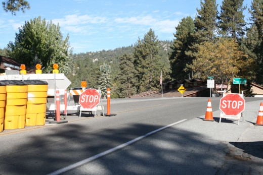 Stop signs were added at the north end of the construction on Highway 243, across the street from Arriba Mexican Restaurant. The stop signs were added by Caltrans after a car exiting the Idyllwild Trailer Park was nearly hit by a car coming through the one way north lane on Highway 243. Now all cars will have to stop at the end of the barricade before proceeding north on 243 or Maranatha or turning right onto Upper Pine Crest. Photo by Marshall Smith 