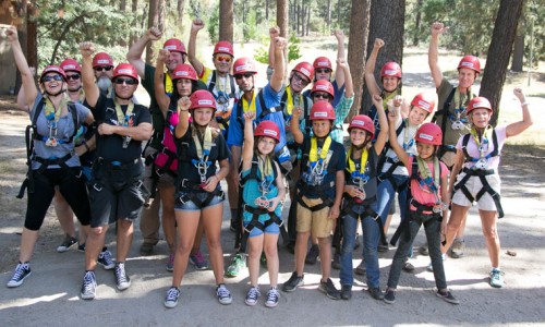 The zip-line group gathers before heading to the line. The Associates of the Idyllwild Arts Academy sponsored the event and AstroCamp offered their time and facilities. Photo by Jenny Kirchner 