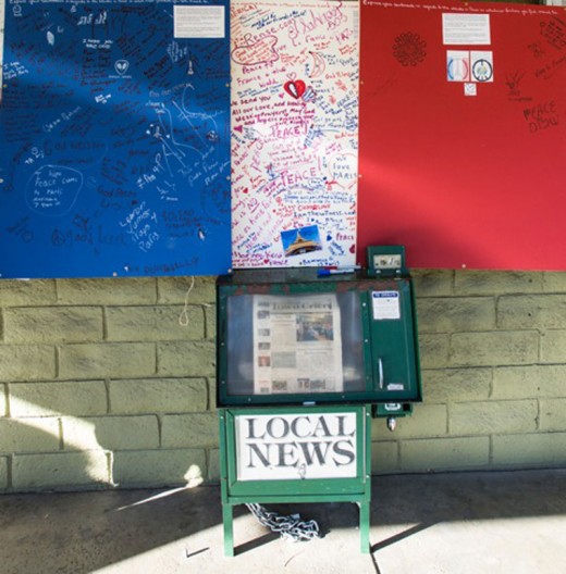 Locals and visitors are sending well wishes to Paris through three posters the Art Alliance of Idyllwild located around town following the terrorist strikes that took more than 120 lives Friday, Nov. 13. Photo by Peter Szabadi