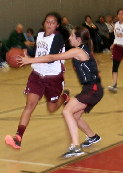 Some of the action during last week’s boys and girls games between Idyllwild Middle School and San Jacinto Valley Academy. SJVA prevailed in both games, but the Idyllwild girls played with heart throughout, and the boys contest was anybody’s game with two minutes remaining. Photos by Jack Clark