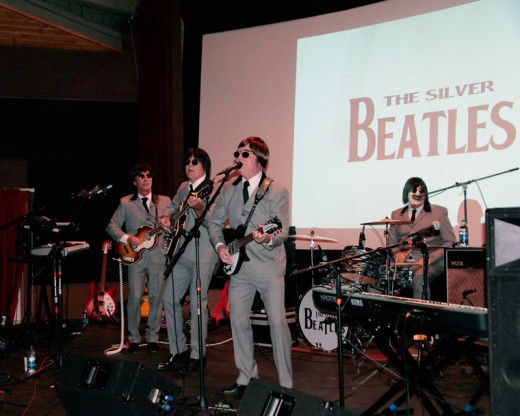 On Friday evening, tribute band The Silver Beatles entertained patrons at the Rustic Theatre. Members of the band are (from left) Barry Scott as Paul McCartney, Larry Stuppy as George Harrison, Steve Anfinson as John Lennon and Gary Long as Ringo Starr. Photo by John Drake 