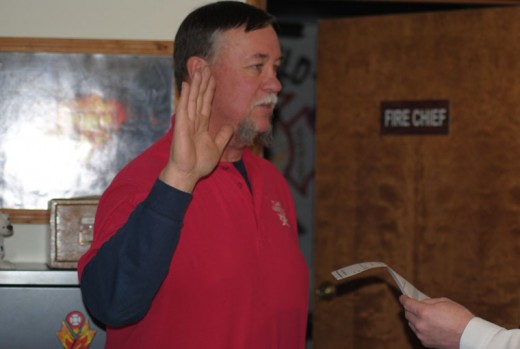 Larry Donahoo (left) is sworn into office for his second term as an Idyllwild Fire Protection District commissioner. Jerry Buchanan (below) begins his third term as president of the Idyllwild Fire Protection District Commission. Rhonda Andrewson (below left) is the Idyllwild Fire Protection District Commission new vice president. Photos by JP Crumrine 