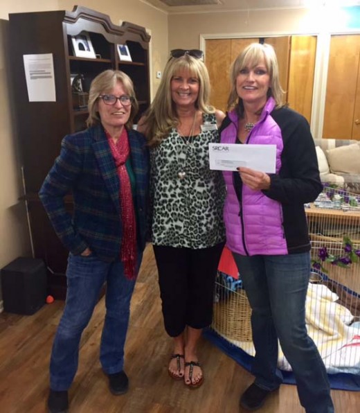 On the Friday before Thanksgiving, the Southwest Riverside County Association of REALTORS® , along with its Affiliate Committee, donated $503.20 to the Living Free Animal Sanctuary. This donation was a result of a Paint and Wine fundraiser. Accepting the donation from Kellie Tuer (center) of Generations Escrow were Tangie Miller (left), director of Administrative Services, and Sharon Caughron (right), executive director of Animal Services, both with Living Free.Photo by Diane Stumpp