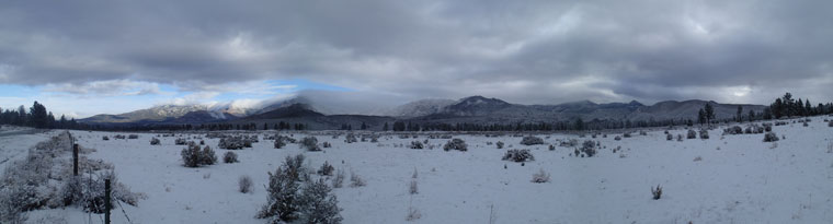 In a rare weather event, Garner Valley had about an inch of snowpack Friday morning near Fobes Ranch, while the distant hills toward Idyllwild (May Valley area) had only a dusting. Photo by Halie Wilson 