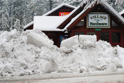 Wednesday morning, it was difficult to see Village Hardware after the snow berms from the previous night’s storm.