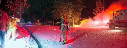 On Tuesday night, Jan. 5, a small ground fire started after power lines went down across Tollgate Road at Delano Drive. Idyllwild Fire had to close the roadways until Southern California Edison arrived to restore electricity, which was out for nearly six hours, to the neighborhood. No injuries were reported. Photo by Jenny Kirchner