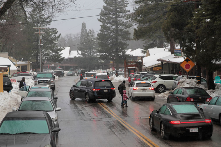 Even the rain Saturday morning did not deter visitors wanting to attend the Idyllwild International Festival of Cinema and play in the snow. Photo Above by John Drake