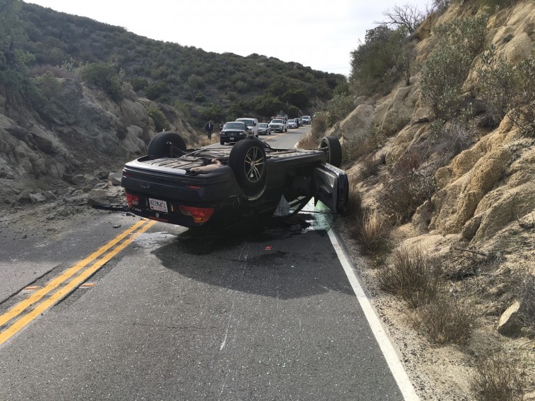 Overturned vehicle on Highway 74