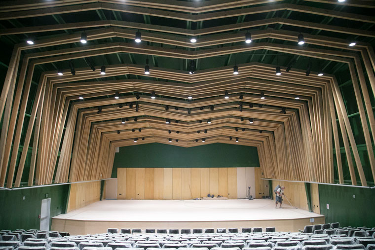 The interior of the nearly ready William M. Lowman Concert Hall, the new state-of-the-art music venue on the Idyllwild Arts campus. The beams visible in the ceiling are part of the acoustical design engineered by ARUP North America, the firm responsible for the designs of the world-famous Sydney (Australia) Opera House, the Centre Pompidou in Paris and the Tate Modern in London. The concert venue should open soon. Photo by Jenny Kirchner
