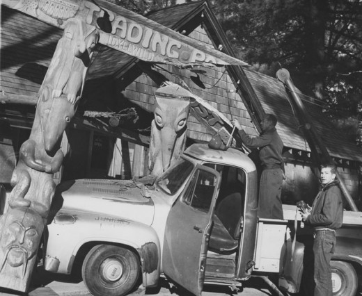 Denny Shinn’s Ford pickup tangled with Idyllwild Department Store totem poles in March 1960. The truck glided unoccupied to the spot from a parking place across the street in an early morning hour. The totems were replaced.File photo 