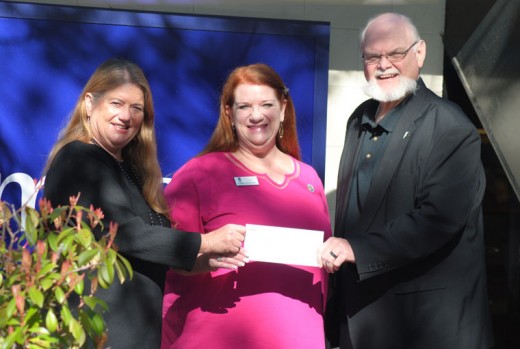 Doug Austin (right) presents a check to Jeri Sue Haney and Susan Schumacher to help sponsor the Idyllwild Soroptomists’ April program, “Celebrating Women in the Arts,” a fundraiser to educate people toward eliminating human trafficking. Photo by JP Crumrine 