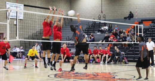 Cody Espinoza (left) of the Hemet High School Junior Varsity Volleyball team, goes up for the block with help from Richard Anderson (no 21). Both the Hemet JVs and varsity teams won last week. Photo by Fred Espinosa