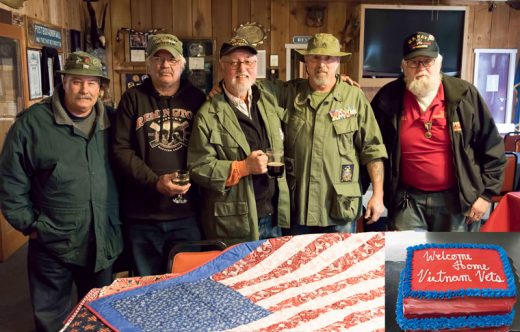 From left, Gary Button, Russell Frederick, Dave Fraser, Ron Draper and Tom Visel were among the many Vietnam veterans honored at the Welcome Home remembrance held at American Legion Post 800 on March 30. This annual event commemorates the date that all combat troops returned home from Vietnam. The Mountain Quilters of Idyllwild donated quilts that were raffled at the event and the Idyllwild Bake Shop and Brew provided the cake. Photo by Tom Kluzak 