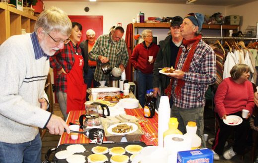 Breakfast was served for those who serve the Idyllwild HELP Center. Volunteers gathered Friday morning for breakfast hosted by HELP Center staff and board members, including real estate broker Larry Bischof (left), who prepared the pancakes. The diverse cadre of volunteers, including members of the Woodies, was recognized for the valuable contributions they make to meeting the primary goal of the center, which is to provide basic help to seniors, the disabled and families in need.Photo by Barry Zander 