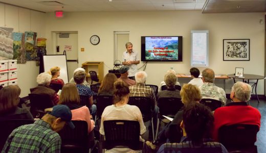 Joe Miglore, a very knowledgeable amateur geologist and hardworking volunteer with the Friends of the Desert Mountains, explains the geology of the San Jacinto Mountains to a packed conference room at the Idyllwild Library on May 18. Sponsored by the Friends of the Idyllwild Library, his fascinating presentation described the origins of our mountains from the interactions of tectonic plates hundreds of millions of years ago to the time when this land was part of a super-continent. Photo by Tom Kluzak 