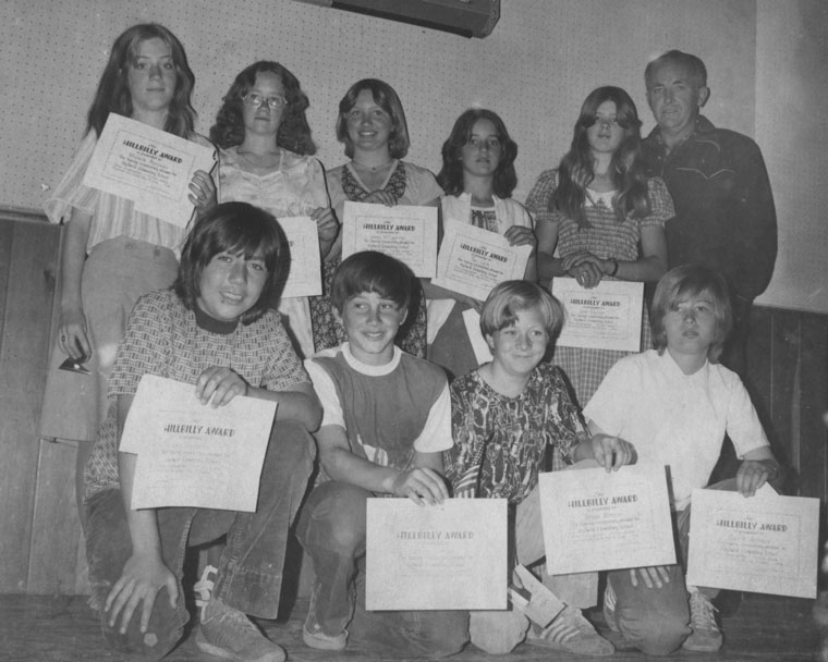 In June 1976, Idyllwild Elementary School awarded Hillbilly certificates to students who had attended the school from kindergarten through seventh grade. Recipients that year were (back row, from left) Shelly Rondeau, Cynthia Peters, Jeni McCaghren and Teri Leih; (from row, from left) Lino Gonzalez, Steve Grewe, Brian Benson and David Arnaiz. Bruce Adams, school board representative from this area, is shown in the back row at far right. File photo