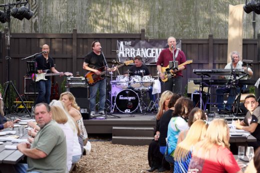 The Arrangements played in Ferro’s outdoor seating area on Saturday evening, June 18. From left, Raoul Ranoa, Mark Cummings, Mike Gustin, Roger Tessier and Bob Richards put some rock on the menu for the large evening crowd. Photo by Tom Kluzak