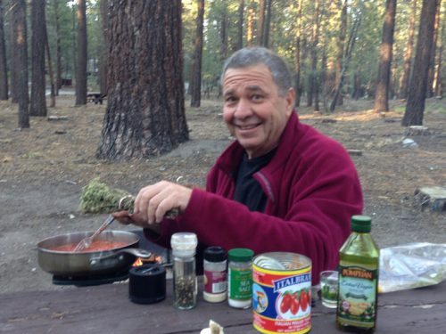 Food columnist Vic Sirkin enjoys preparing a meal while camping in Northern California. Photo by Kate Sirkin 