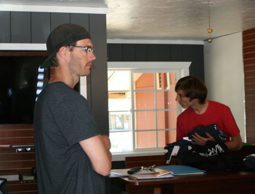 Jeremy Teeguarden, Idyllwild Arts employee and designer of the shop, is seen here stocking the new emporium.