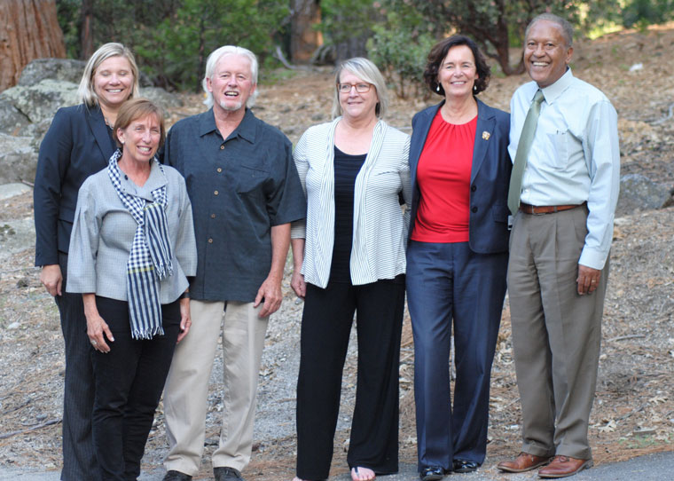 After discussing the pathway to building the Idyllwild Community Center, 3rd District Supervisor Chuck Washington (right) posed with the group. From left are Suzanne Holland, assistant director of the county Economic Development Agency, Janice Lyle, president of the San Jacinto Mountain Community Center board, Robert Priefer, board member, Kathy Wilson, Community Service Area 36 Advisory Committee member, and Opal Hellweg, legislative assistant on Washington’s staff.	 Photo by JP Crumrine