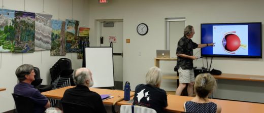 Town Crier photographer Tom Kluzak discusses color management, printing and photographic software with members of the Idyllwild Photographers at the Idyllwild Library on June 22. The group, which meets on the fourth Wednesday of every month at 5 p.m., is open to anyone with an interest in photography. Photo by Tom Kluzak 