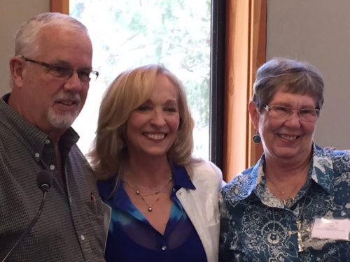 Associates of Idyllwild Arts Foundation past-president Anne Erikson (center) poses with Volunteers of the Year Terry and Diana Kurr after announcing their award. Photo by Mary Morse