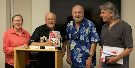 Ron Singerton with his historical novel “The Silk and the Sword” is flanked by Librarian Shannon Ng (left), Bill Barnett and Ken Luber last Saturday during his talk at the Idyllwild Library. Photo by John Drake