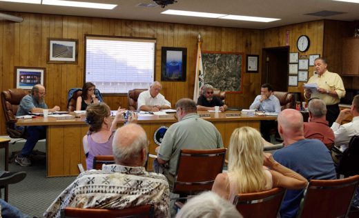 About 25 people showed up for the Idyllwild Water District board meeting Wednesday night, July 20. Some challenged the board on rates, water meters and transparency. Vic Sirkin (standing, right) gave a prepared speech critical of directors and the manager, and calling for directors’ resignations. Excerpts from the meeting may be viewed at idyllwild towncrier.com. Photo by Tom Kluzak