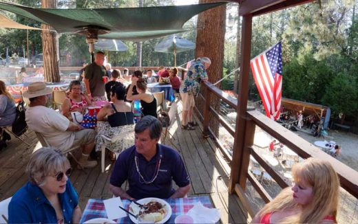 American Legion Post 800 held its annual barbecue last Saturday. Serving beef and pork that had cooked in an open pit for 15 hours, along with coleslaw, beans, corn on the cob and rolls, the meals were complemented by music from Mark and the Workin’ Men. Photo by Tom Kluzak