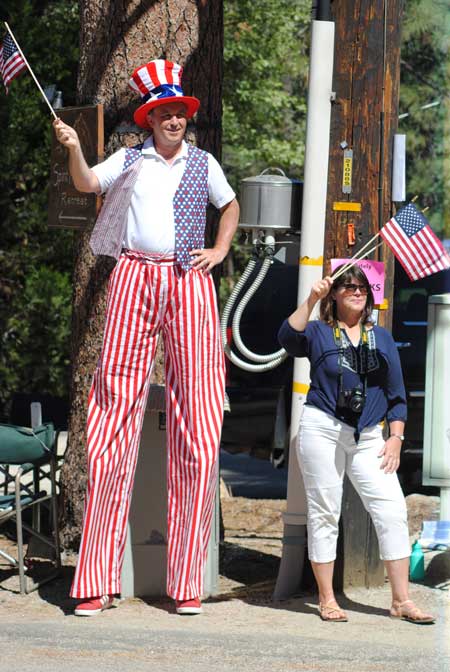 Dr. Charles Schelly grew longer legs for the parade and tottered down North Circle.Photo by JP Crumrine