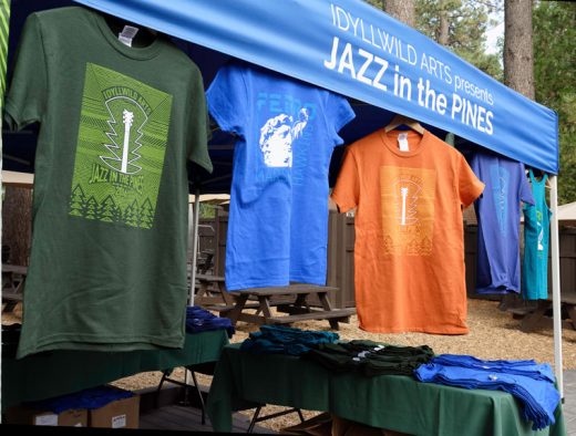 The official 2016 Jazz in the Pines T-shirts were introduced on Tuesday, Aug. 2, at Ferro. Patrons tickets also were available. T-shirts come in men’s and women’s sizes; women also have the option of a tank top. Proceeds go to support Idyllwild Arts. Jazz in the Pines starts Friday evening, Aug. 19, with the Patrons Dinner and runs through Sunday, Aug. 21. Photo by Tom Kluzak