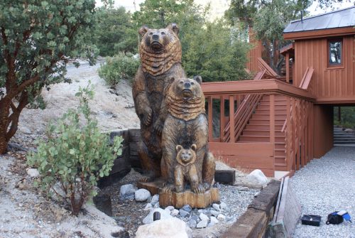 Three David Roy carved bears, one of them nearly 10 feet tall, were stolen from in front of a home on Upper Pine Crest Drive. The incident is under investigation. Photo courtesy Jim Brannan