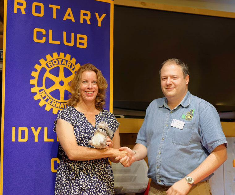 Christina Nordella receives an Idyllwild Rotary squirrel from Rotary President after she spoke to the club at its weekly meeting on Wednesday, Aug. 31. Nordella has been an active volunteer and philanthropist in Idyllwild for many years. Photo by Tom Kluzak