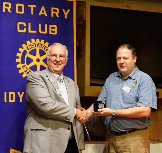 Rotary District 5330 Governor Bob Duistermars (left) receives a Rotary mug from Idyllwild Rotary President Marc Kassouf at the weekly club meeting on Aug. 24. Duistermars represents more than 60 Rotary Clubs in the Inland Empire. Each of these sponsors multiple projects to benefit their own and other communities. His visit serves to highlight one of the benefits of Rotary membership: a member traveling anywhere in the world can find a Rotary Club at which he or she will be welcomed with open arms.Photo by Tom Kluzak