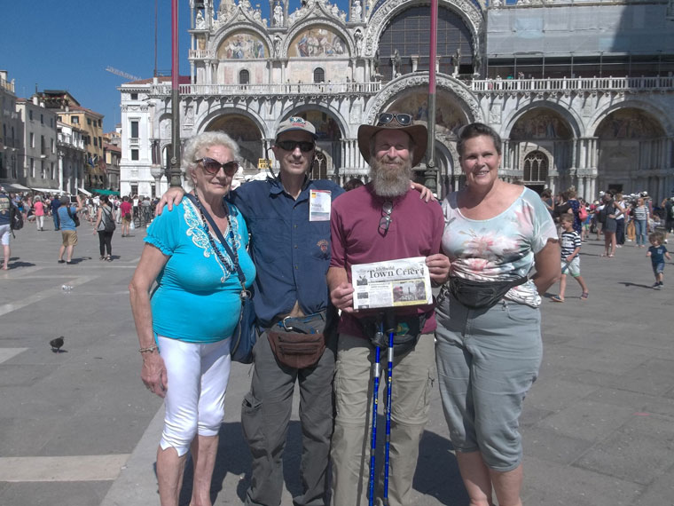 Travels with the TC Aunt Elita (whom they were visiting and who lives near Venice), brothers David and Steve Kunkle, friend Maria Byron, with the Town Crier while they were at St. Marks Square in Venice.Photo courtesy Steven Kunkle