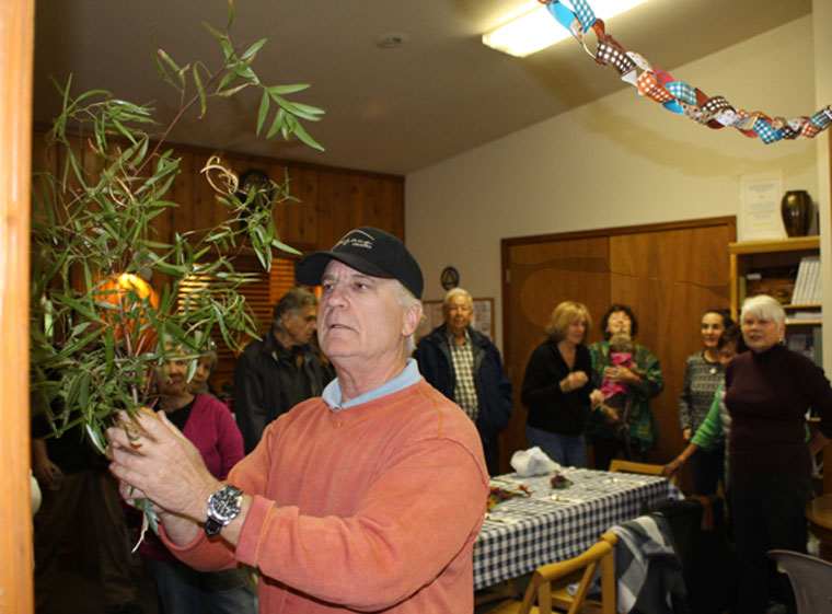 The Celebration of Sukkot, commemorating the traditional end of the harvest, was observed by members of Temple Har Shalom of Idyllwild Sunday. For one of the elements of the observance, Mountain Center resident Jerry Prager led the blessing of willows, symbolic of trees along the Jordan River where Israelites camped before entering the Promised Land.